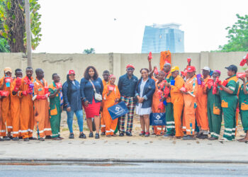 Sovereign Trust Displays Love Cares To Lagos Waste Managers