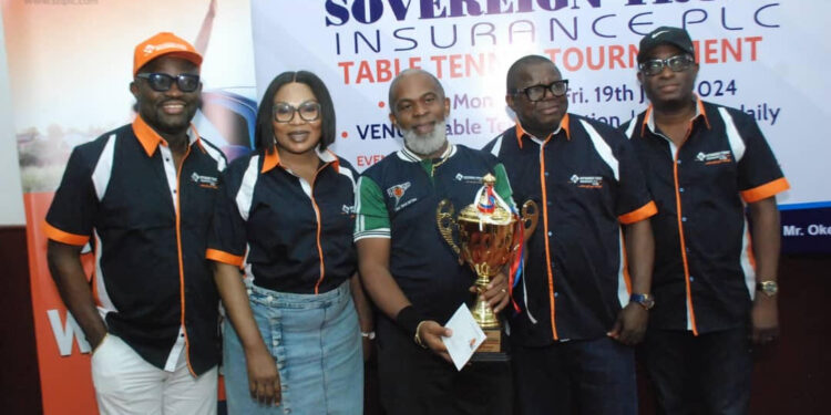 Winners Parade Trophies At Sovereign Trust Insurance Plc Table Tennis